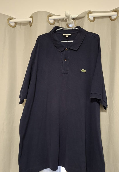 Camisa polo azul marinho da marca Lacoste original, tamanho 4XL ( peça ampla), em ótimo estado!!!