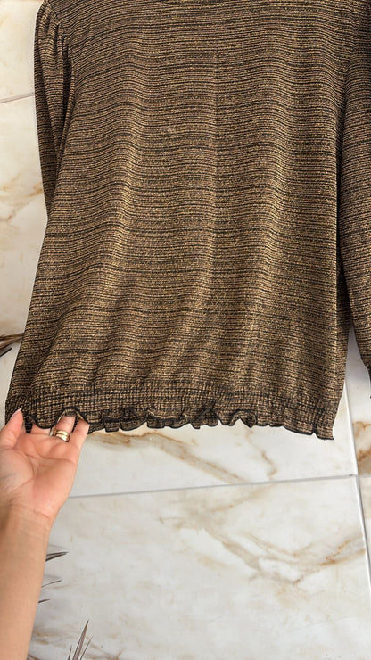 Blusa em lurex dourado elástico na cintura e braços