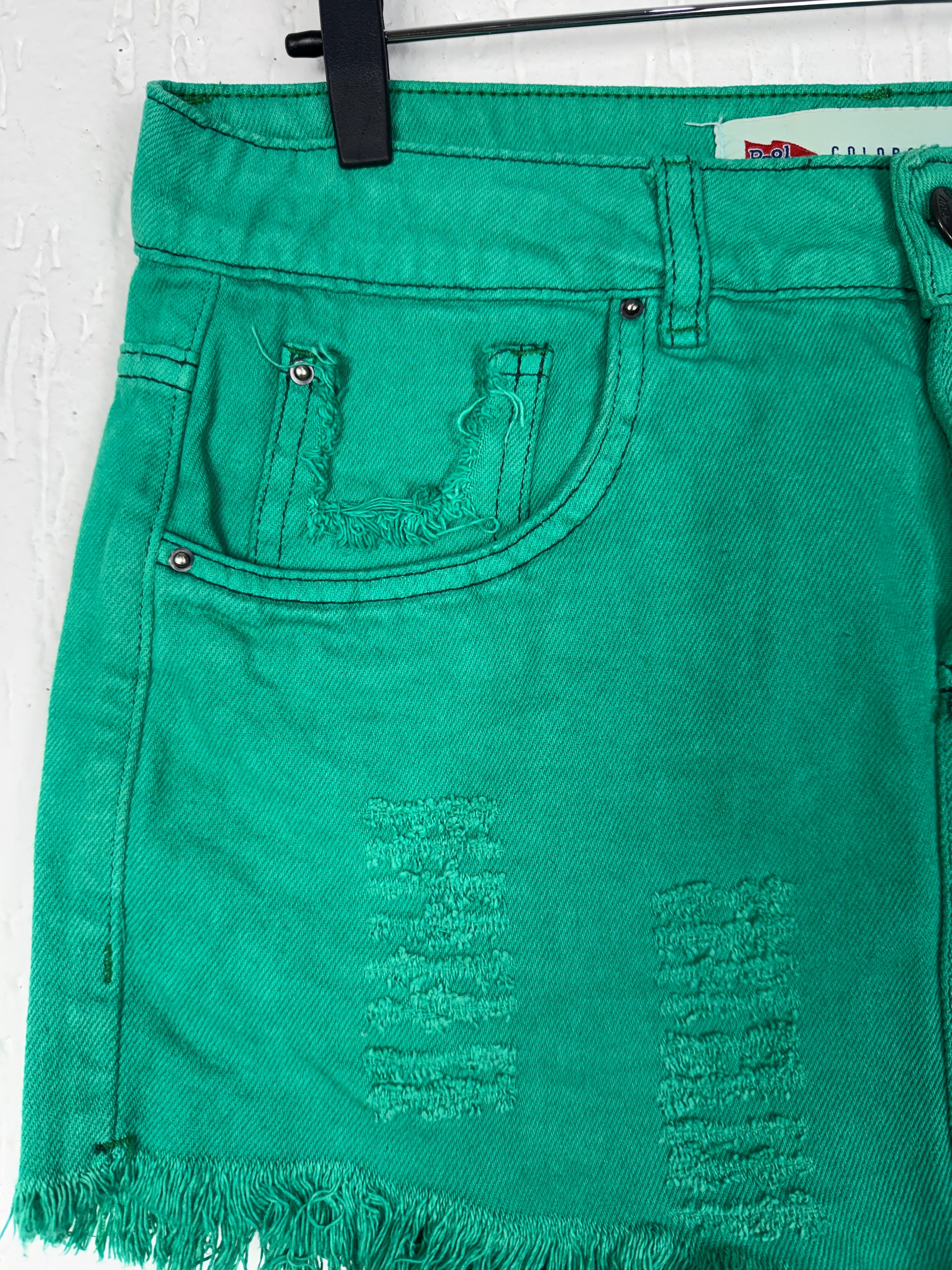 Saia Jeans Verde Destroyed Curta Barra Desfiada