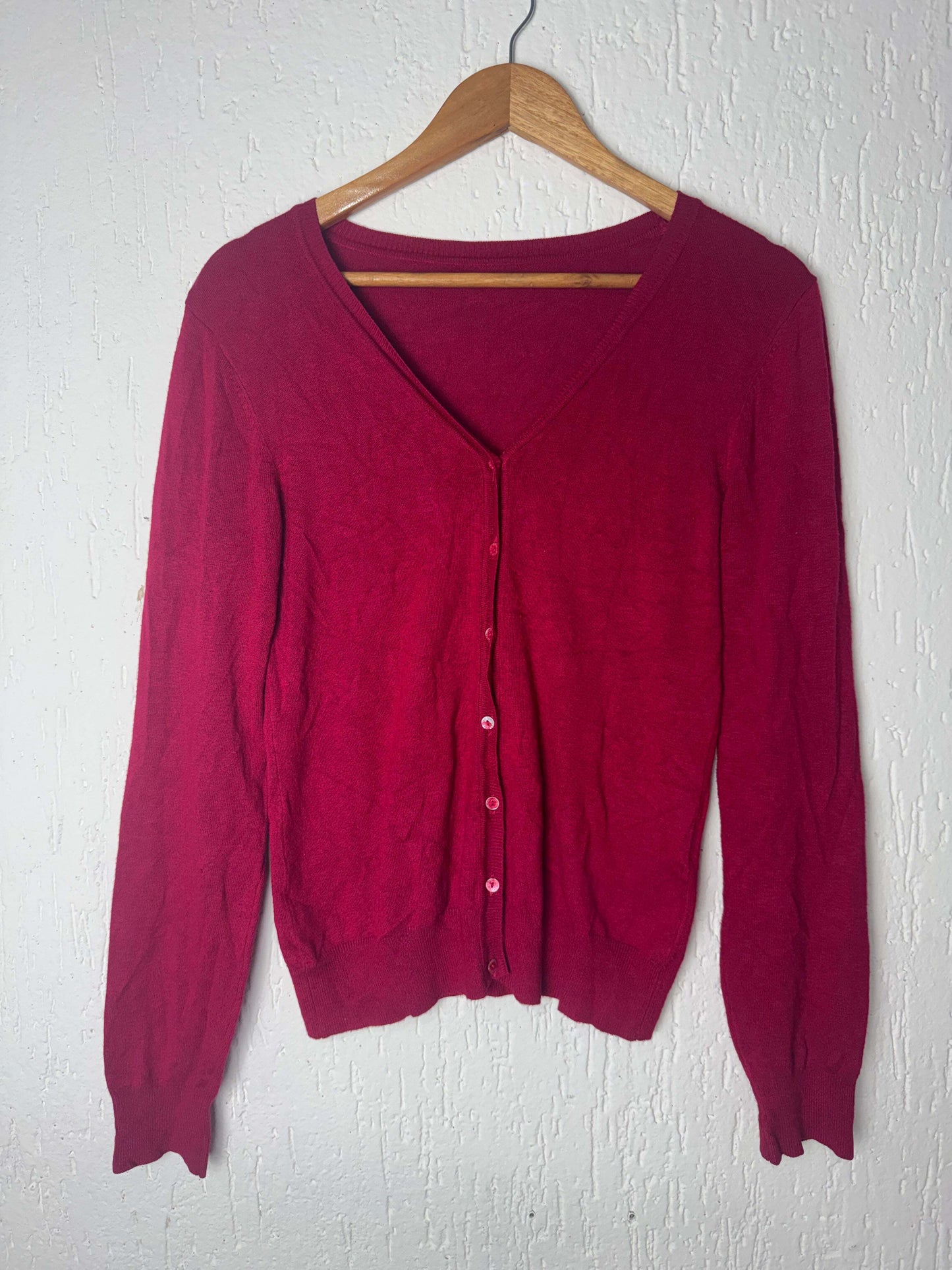 Blusa de tricô com fechamento de botão