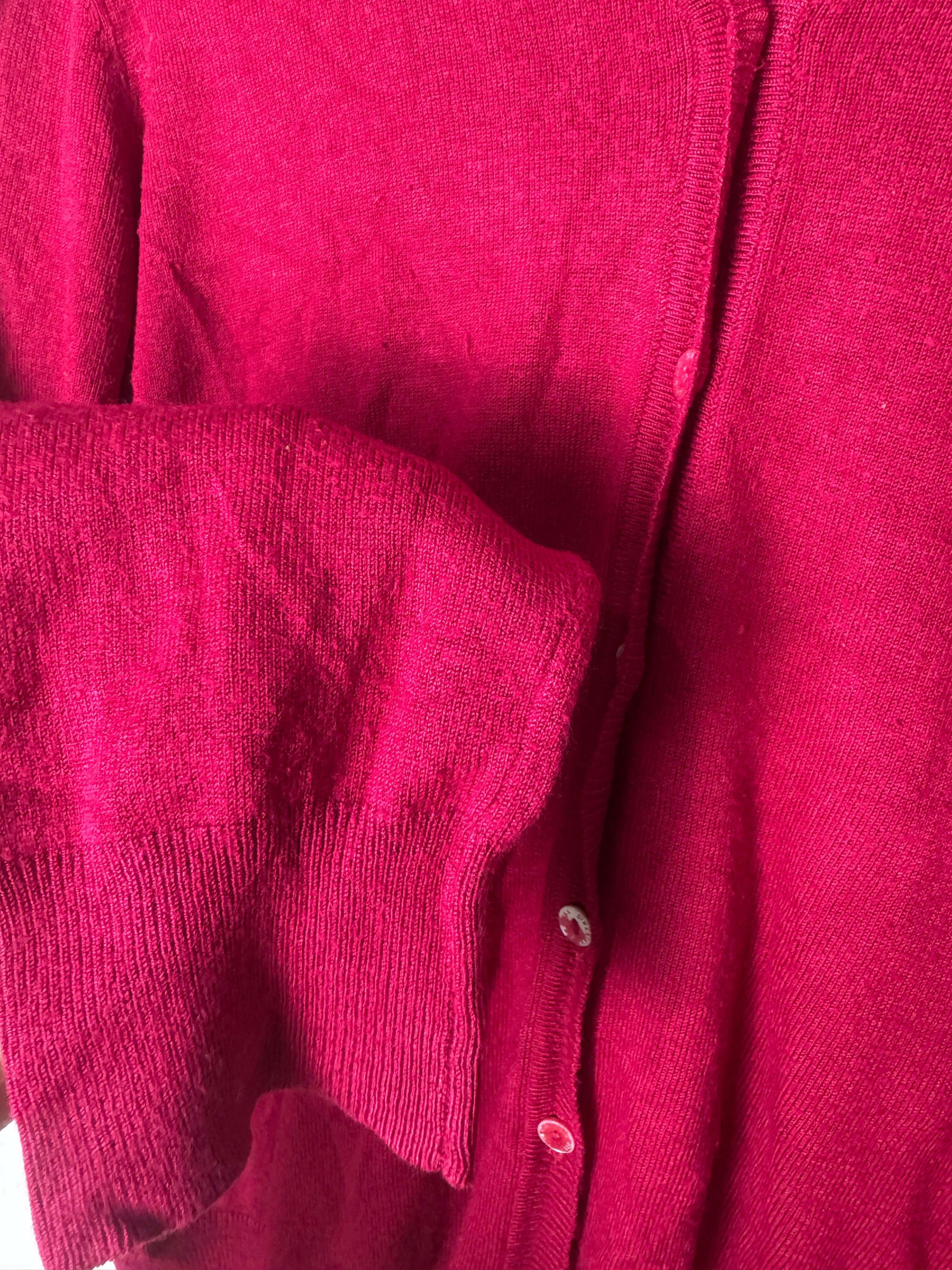 Blusa de tricô com fechamento de botão