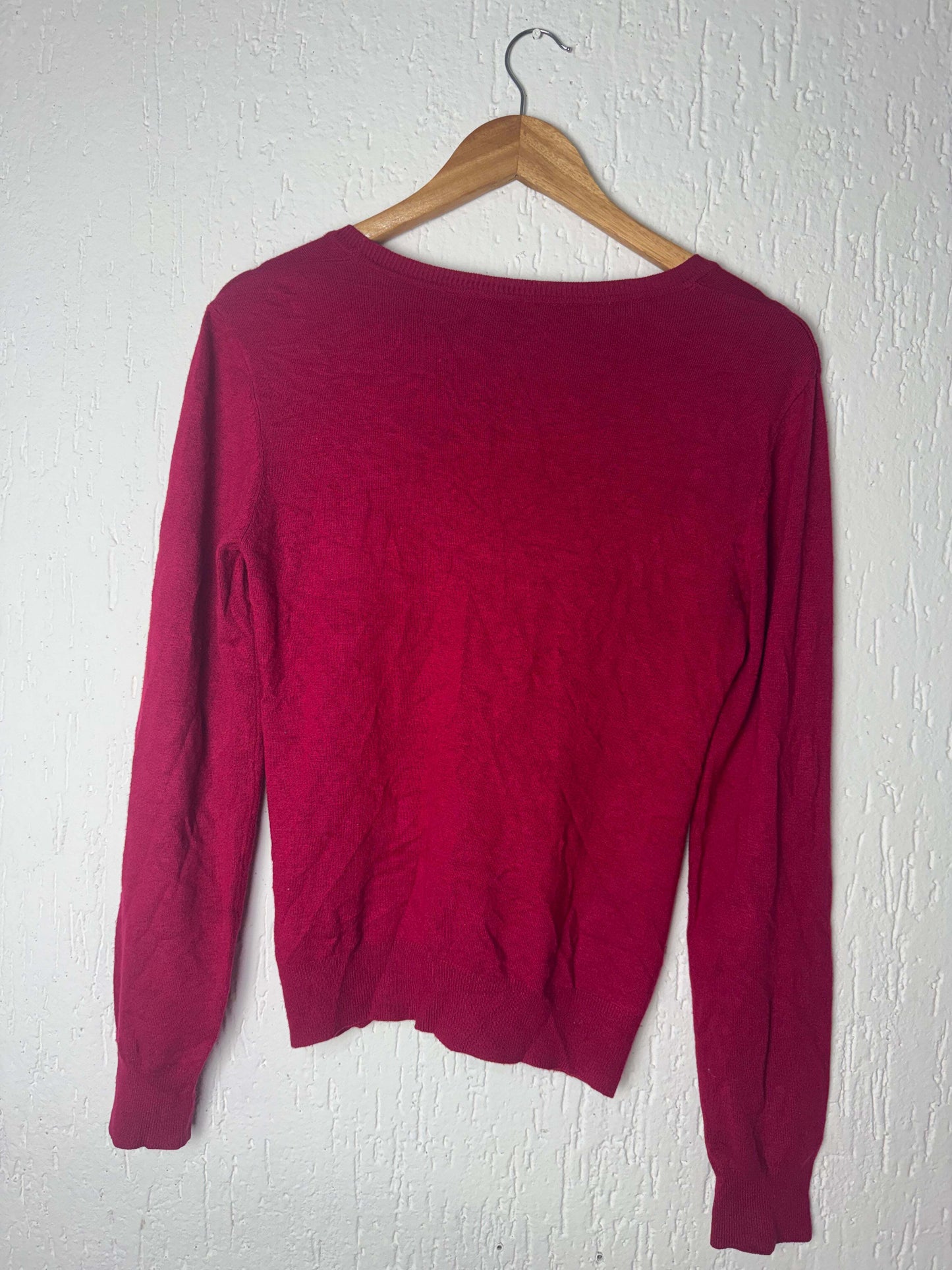Blusa de tricô com fechamento de botão