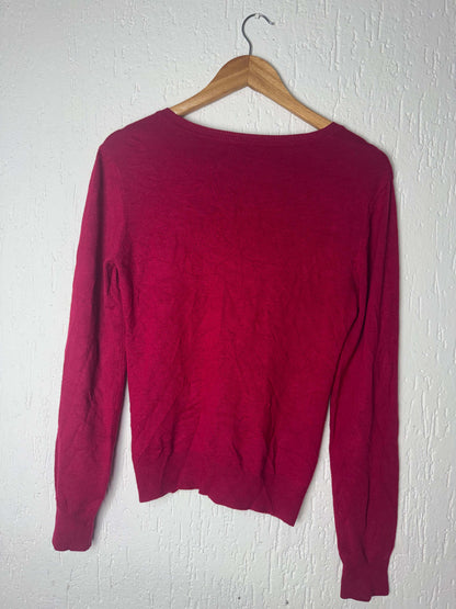Blusa de tricô com fechamento de botão