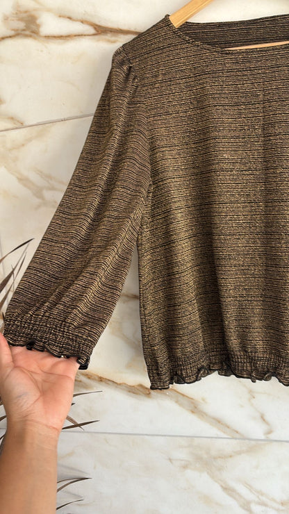 Blusa em lurex dourado elástico na cintura e braços
